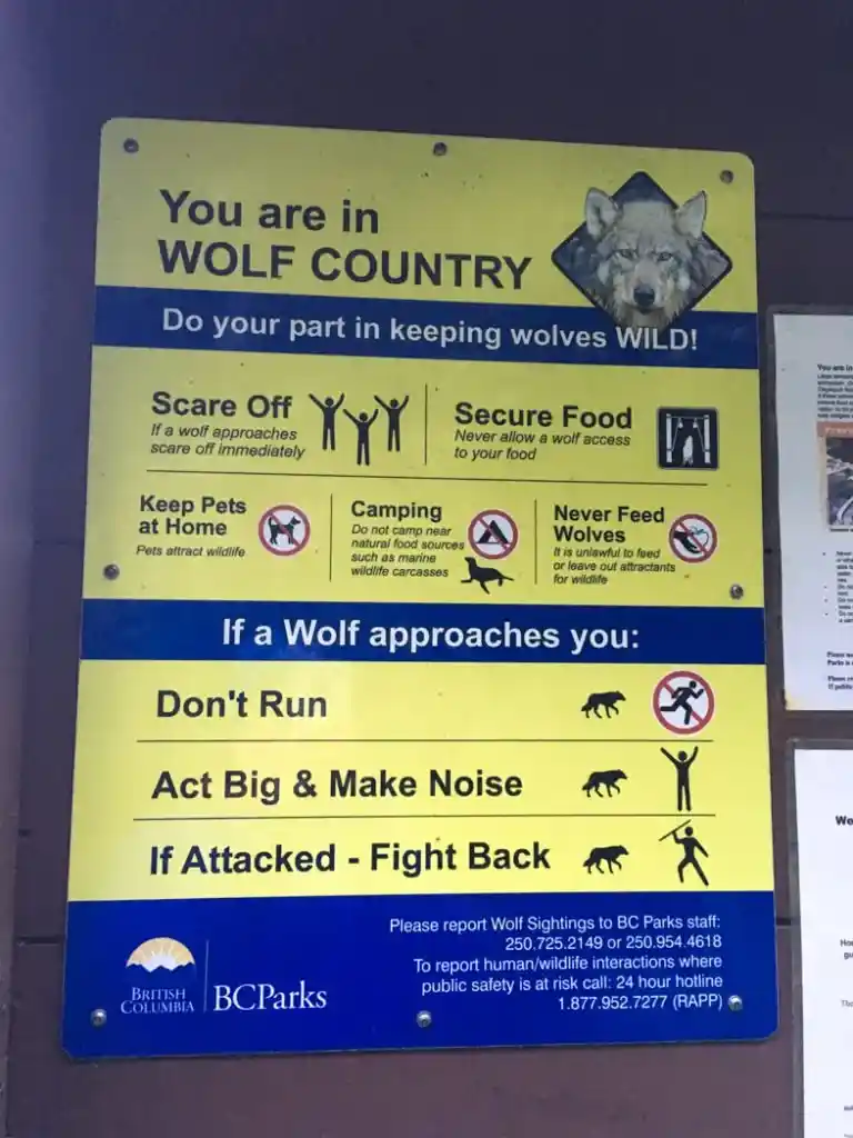 Sign warning about wolves on the Wild Side Trail near Tofino, BC
