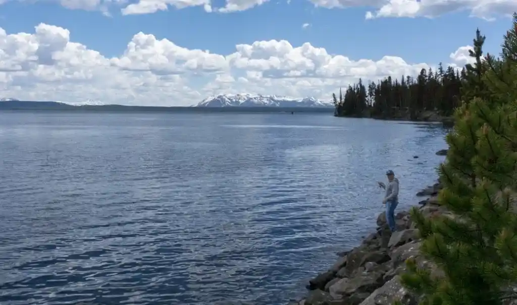 A man fishing on Yellowstone Lake