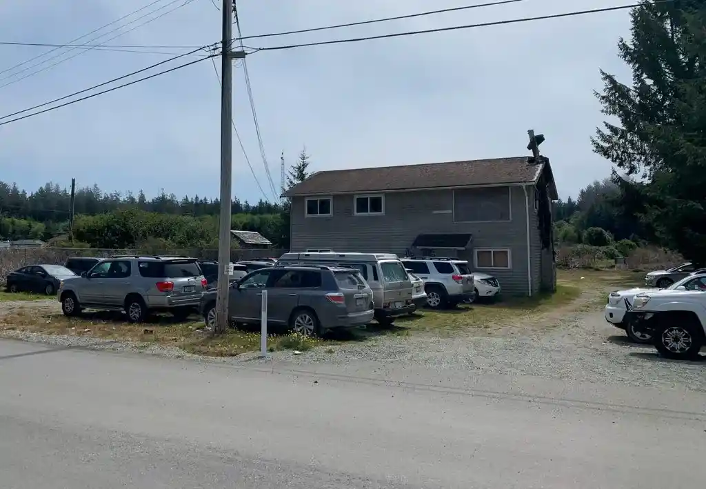 Hikers' cars parked near the Gordon River/Port Renfrew trailhead for the West Coast Trail