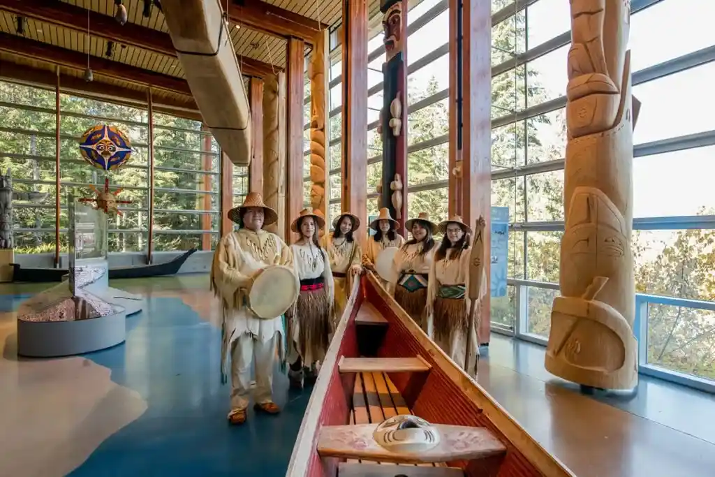 Cedar canoe and indigenous guides at the Squamish Lil'wat Cultural Centre in Whistler