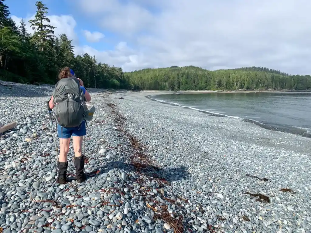 Hiker on the beach near Nahwitti River