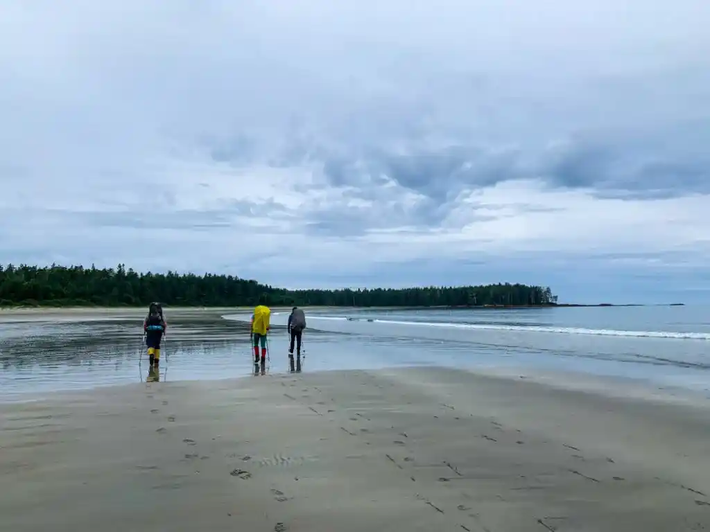 Hikers leaving Shuttleworth Bight on the North Coast Trail