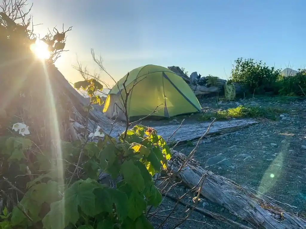 A backpacking tent at sunset on the Tatchu Peninsula on Vancouver Island
