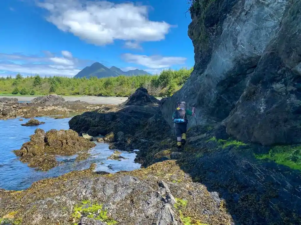 Scrambling around a tidal obstacle south of Porritt Creek