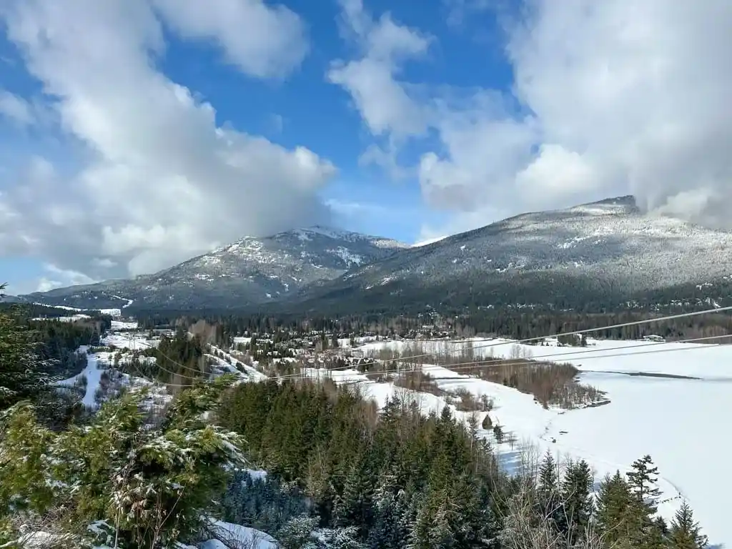 View from the Green Lake Viewpoint at the Lost Lake Snowshoe Trails in Whistler, BC