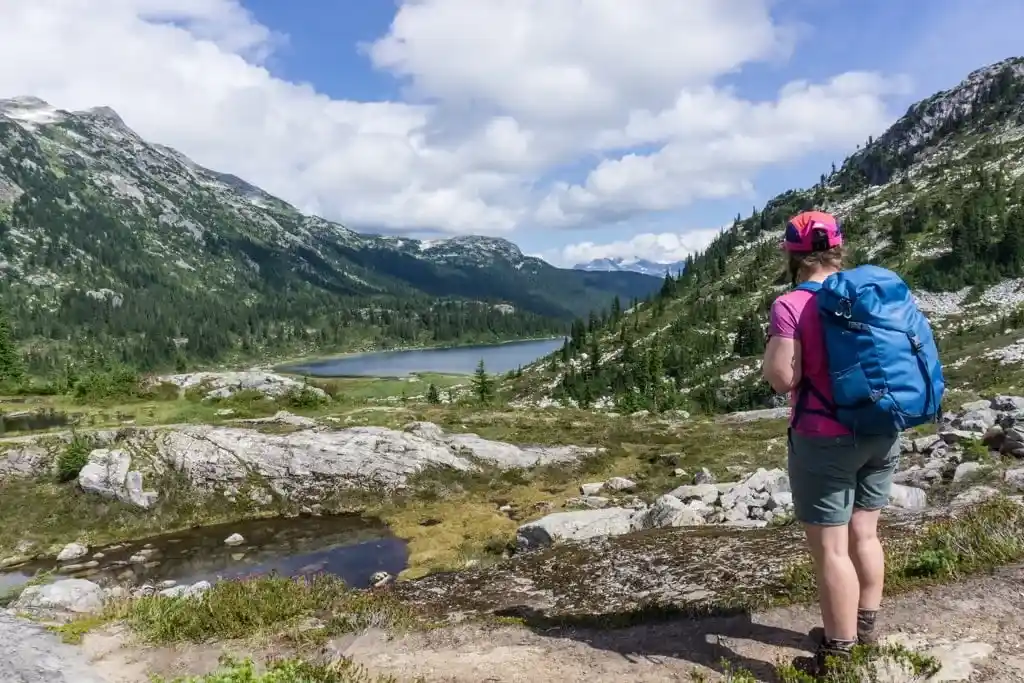 A hiker at Rainbow Pass in Whistler - one of the best places to go backpacking in BC without a car