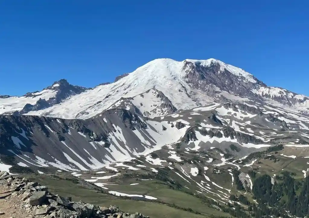 Mount Rainier seen from a hiking trail.