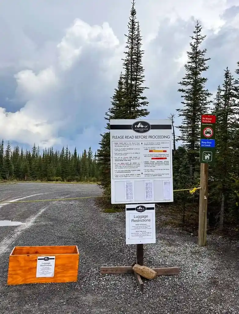 Info signs at the helicopter flight check in for Mount Assiniboine