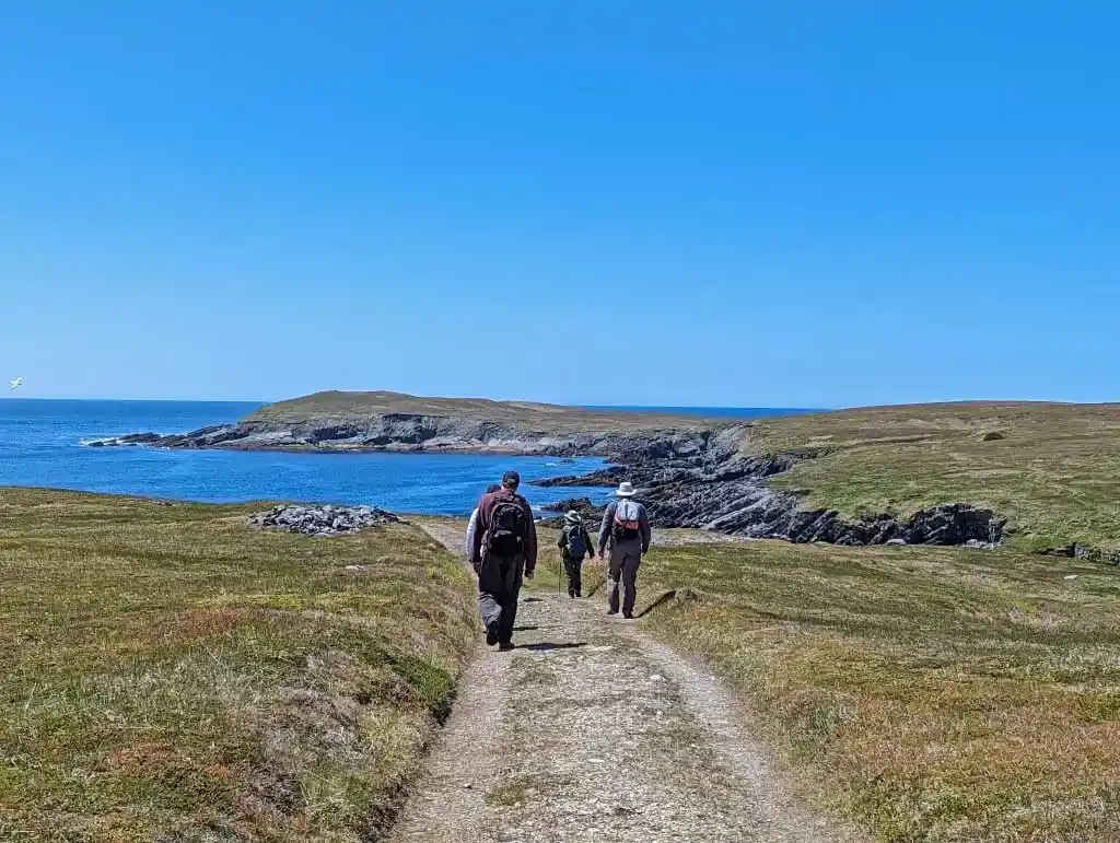 Hikers at Mistaken Point in Newfoundland