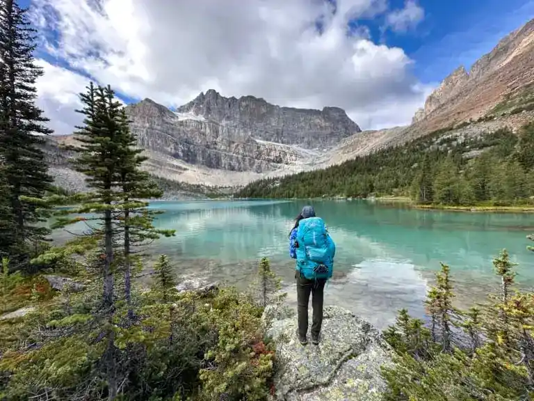 A hiker at Myosotis Lake